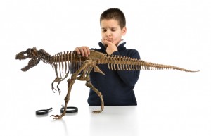 young scientist with dinosaur